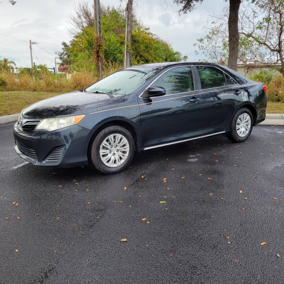 2014 Toyota Camry for sale at VERO APEX in Vero Beach, FL