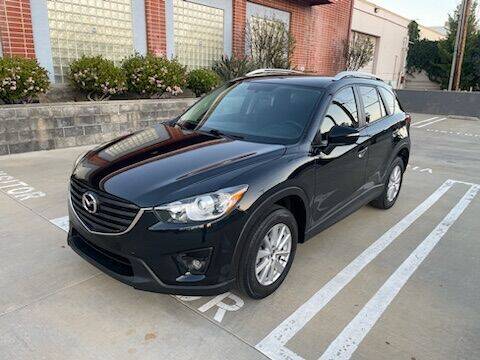 2016 Mazda CX-5 for sale at LOW PRICE AUTO SALES in Van Nuys CA