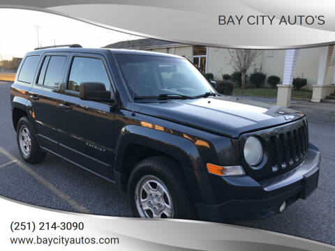 2014 Jeep Patriot for sale at Bay City Auto's in Mobile AL
