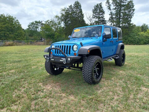 2010 Jeep Wrangler Unlimited for sale at LA PULGA DE AUTOS in Dallas TX