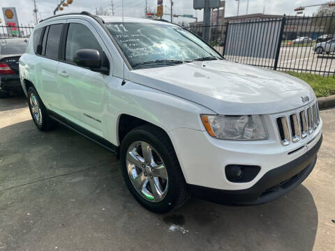 2011 Jeep Compass for sale at Buy-Fast Autos in Houston TX