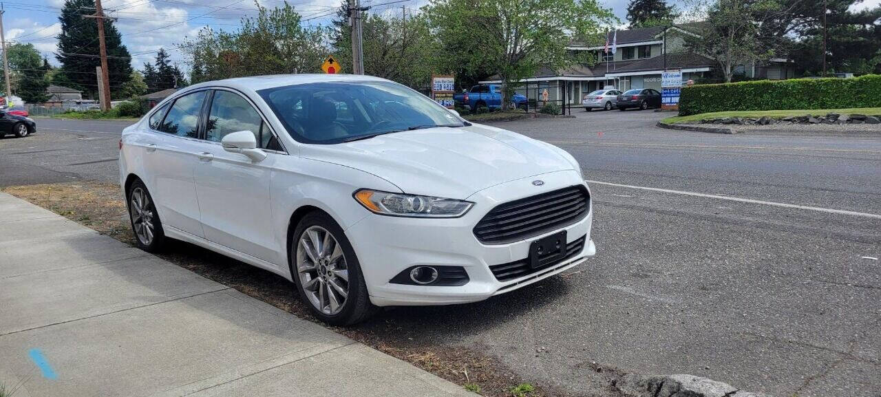 2015 Ford Fusion for sale at BENCHMARK AUTO SALES in Parkland, WA