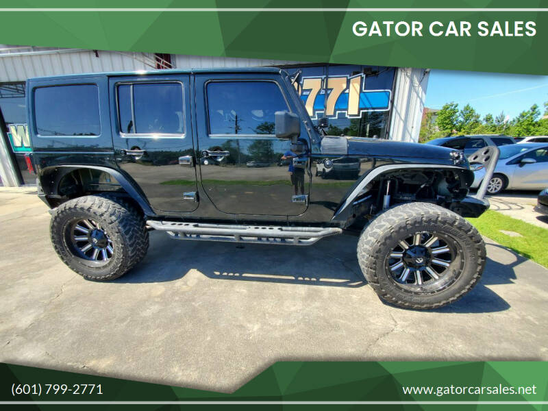 2012 Jeep Wrangler Unlimited for sale at Gator Car Sales in Picayune MS