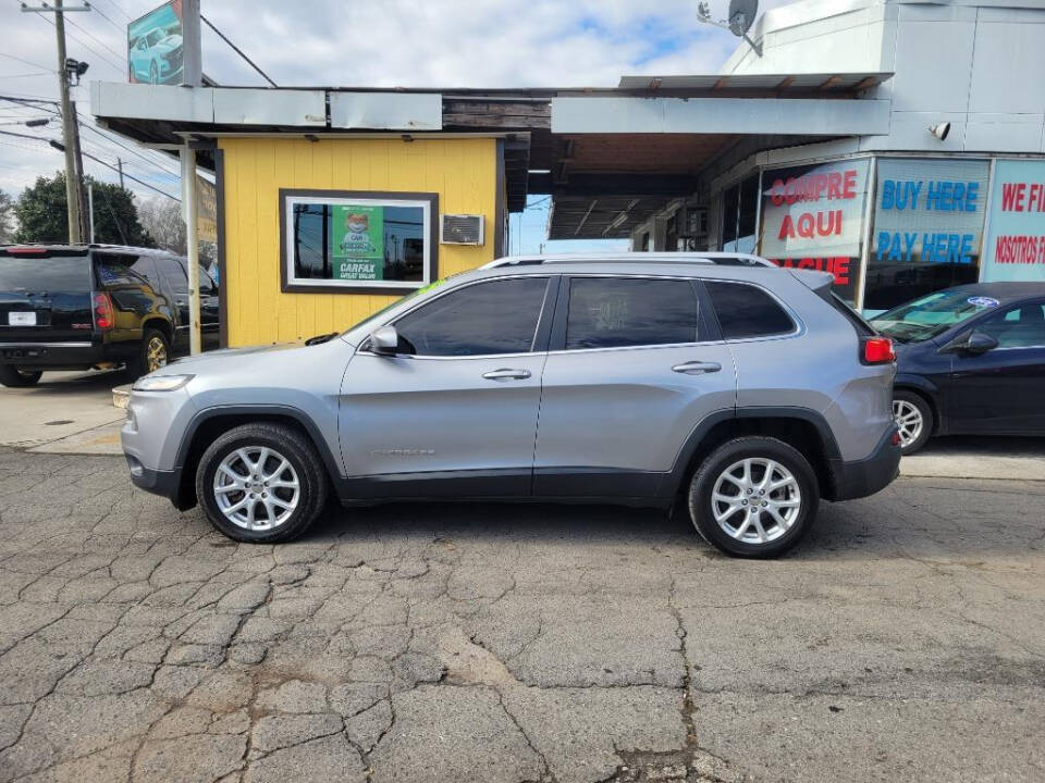 2015 Jeep Cherokee for sale at DAGO'S AUTO SALES LLC in Dalton, GA