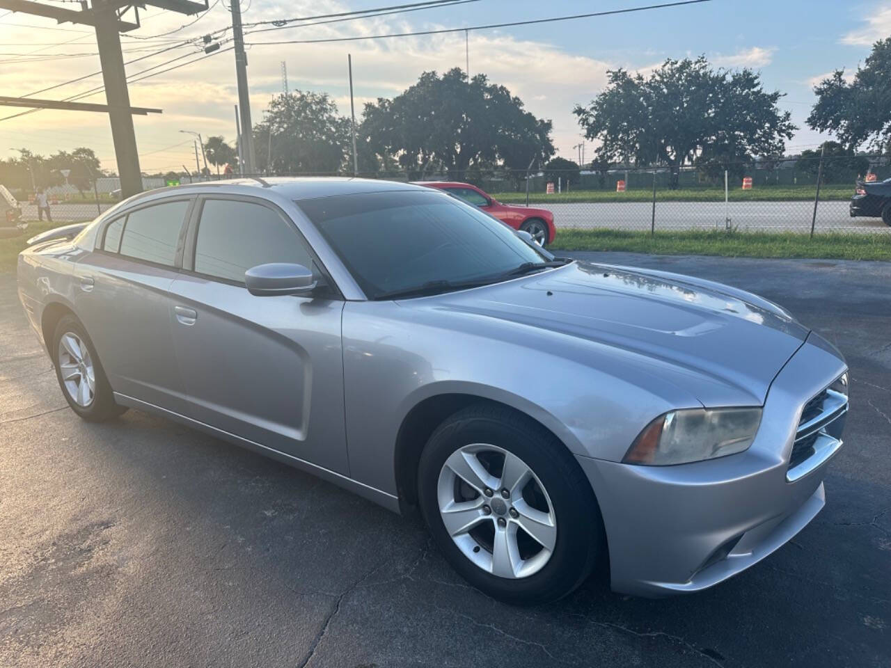 2013 Dodge Charger for sale at NOVA AUTO SALES in Orlando, FL