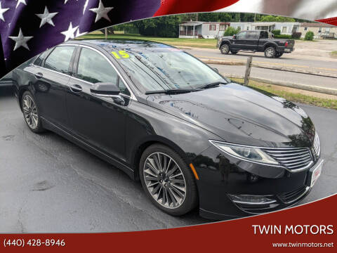 2015 Lincoln MKZ for sale at TWIN MOTORS in Madison OH