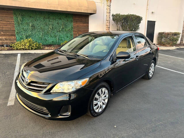 2013 Toyota Corolla for sale at STM AUTO GROUP LLC in Corona, CA