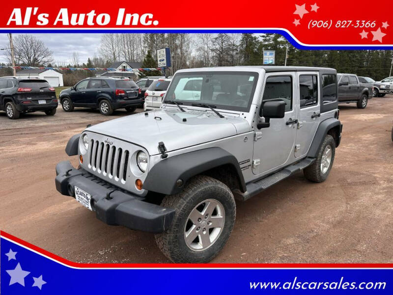 2012 Jeep Wrangler Unlimited for sale at Al's Auto Inc. in Bruce Crossing MI