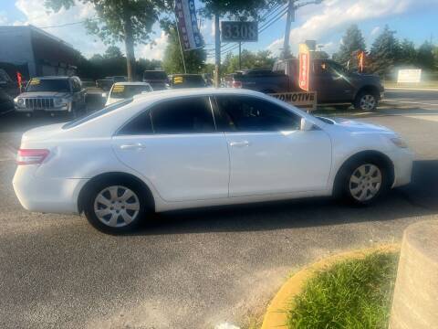 2011 Toyota Camry for sale at King Auto Sales INC in Medford NY