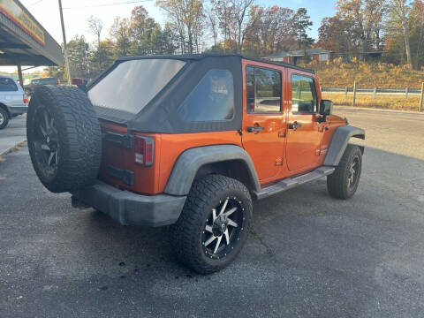 2011 Jeep Wrangler Unlimited for sale at Brady Car & Truck Center in Asheboro NC