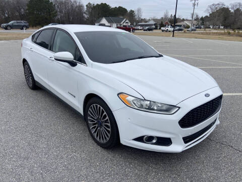 2014 Ford Fusion Hybrid for sale at Carprime Outlet LLC in Angier NC