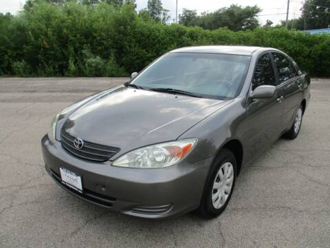 2004 Toyota Camry for sale at Triangle Auto Sales in Elgin IL