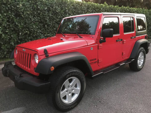 2018 Jeep Wrangler JK Unlimited for sale at DENMARK AUTO BROKERS in Riviera Beach FL