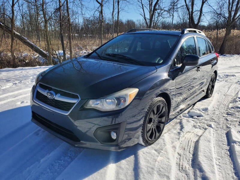 2012 Subaru Impreza for sale at COOP'S AFFORDABLE AUTOS LLC in Otsego MI