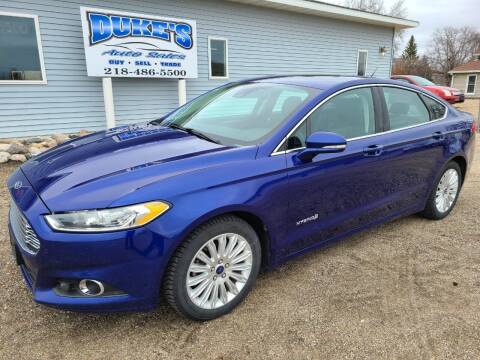2014 Ford Fusion Hybrid for sale at Dukes Auto Sales in Hawley MN