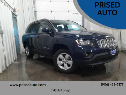 2016 Jeep Compass for sale at PRISED AUTO in Gladstone MI