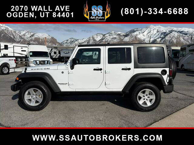 2015 Jeep Wrangler Unlimited for sale at S S Auto Brokers in Ogden UT