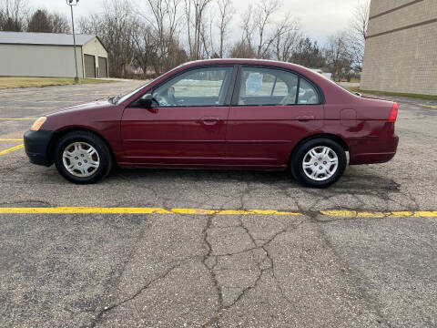 2002 Honda Civic for sale at Caruzin Motors in Flint MI