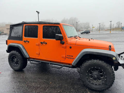 2013 Jeep Wrangler Unlimited for sale at CARS PLUS in Fayetteville TN