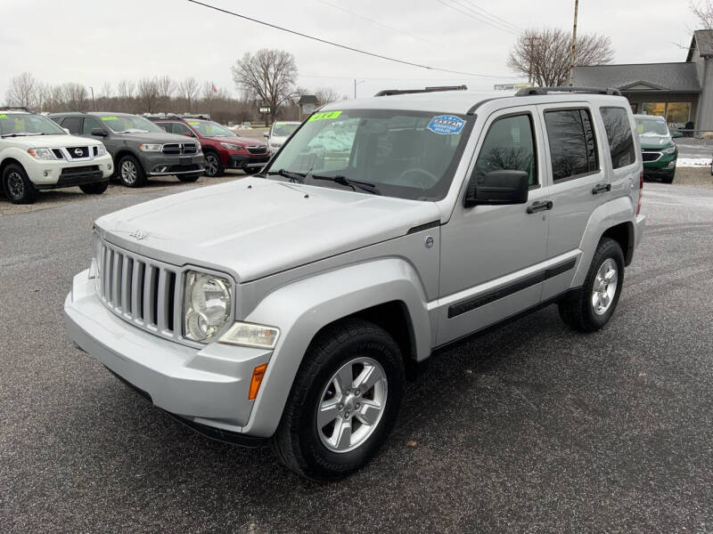 Used 2012 Jeep Liberty Sport with VIN 1C4PJMAK5CW116203 for sale in Traverse City, MI