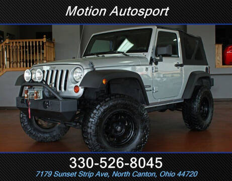 2012 Jeep Wrangler for sale at Motion Auto Sport in North Canton OH