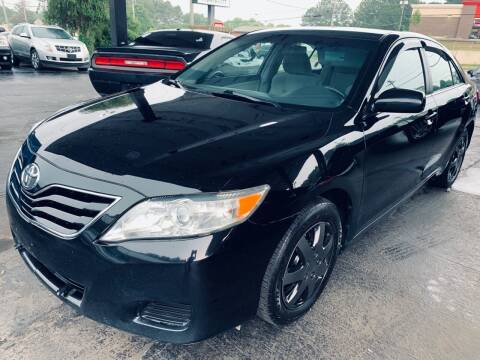 2010 Toyota Camry for sale at Magic Motors Inc. in Snellville GA