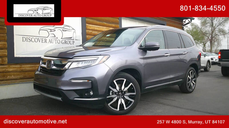 2021 Honda Pilot Touring w/Rear Captain's Chairs