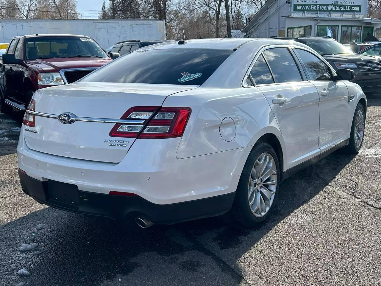 2016 Ford Taurus for sale at GO GREEN MOTORS in Lakewood, CO