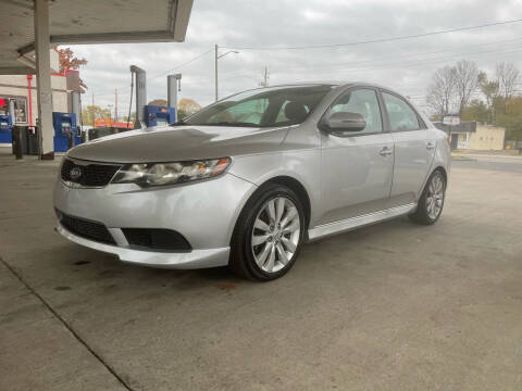 2013 Kia Forte for sale at JE Auto Sales LLC in Indianapolis IN