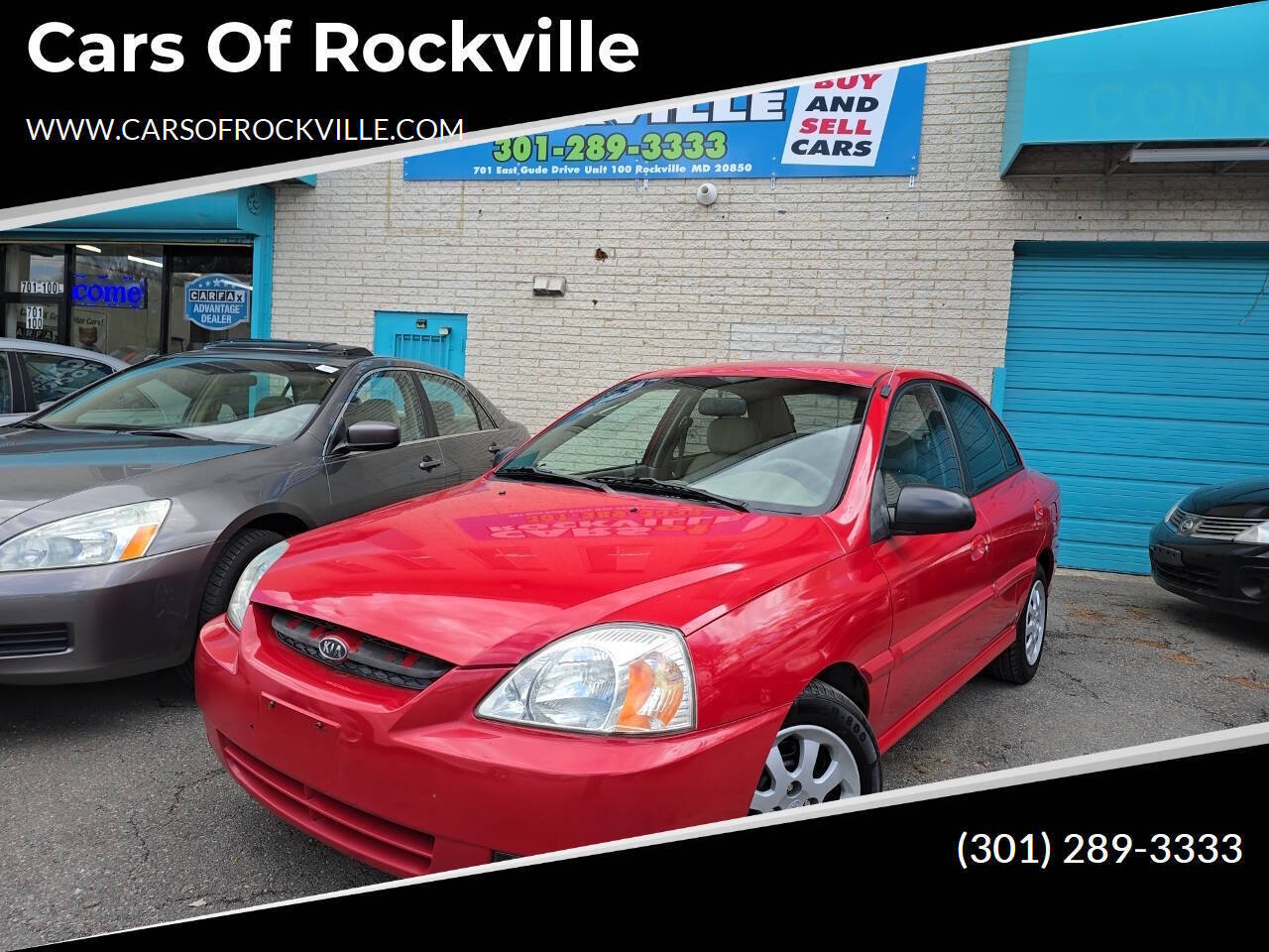 Red 2003 Kia Rio Base 4dr Sedan 1