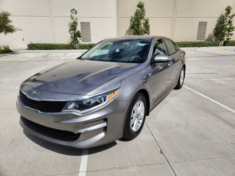 2016 Kia Optima for sale at E and M Auto Sales in Bloomington CA