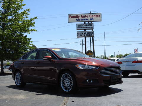 2015 Ford Fusion for sale at FAMILY AUTO CENTER in Greenville NC