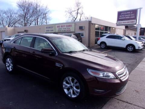2010 Ford Taurus for sale at Gregory J Auto Sales in Roseville MI