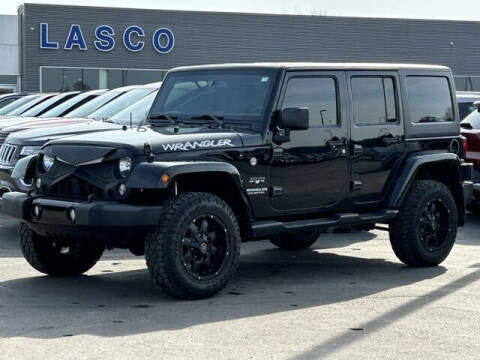 2016 Jeep Wrangler Unlimited for sale at LASCO FORD in Fenton MI