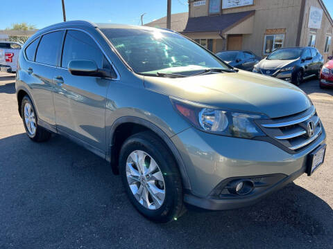 2012 Honda CR-V for sale at BERKENKOTTER MOTORS in Brighton CO