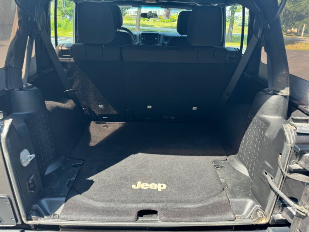 2014 Jeep Wrangler Unlimited for sale at BRW Motorsports LLC in Derry, NH