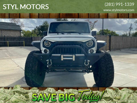2010 Jeep Wrangler Unlimited for sale at STYL MOTORS in Pasadena TX