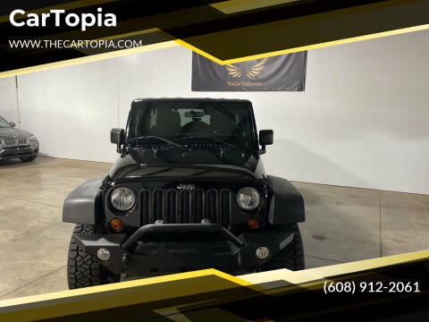 2011 Jeep Wrangler Unlimited for sale at CarTopia in Deforest WI