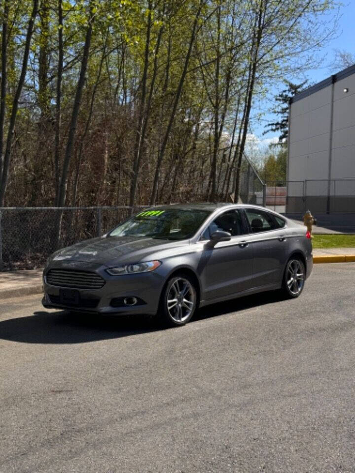 2014 Ford Fusion for sale at LV MOTORS in everett, WA