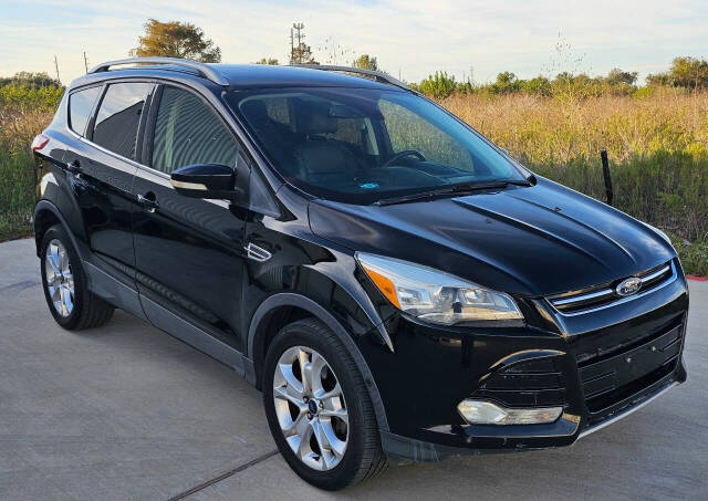 2016 Ford Escape for sale at CAR MARKET AUTO GROUP in Sugar Land, TX