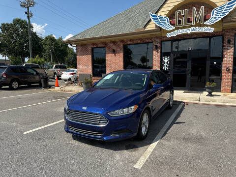 2014 Ford Fusion for sale at Georgia Luxury Motor Sales in Cumming GA