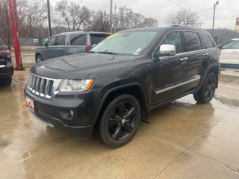 2011 Jeep Grand Cherokee for sale at Azteca Auto Sales LLC in Des Moines IA