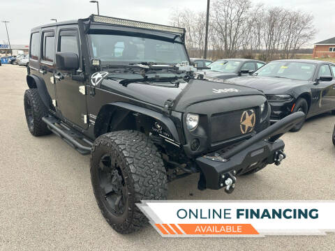2016 Jeep Wrangler Unlimited for sale at Postal Pete in Galena IL