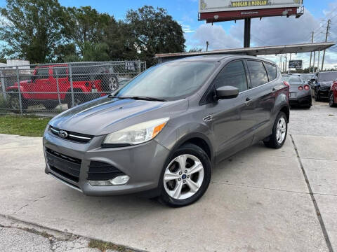 2014 Ford Escape for sale at P J Auto Trading Inc in Orlando FL