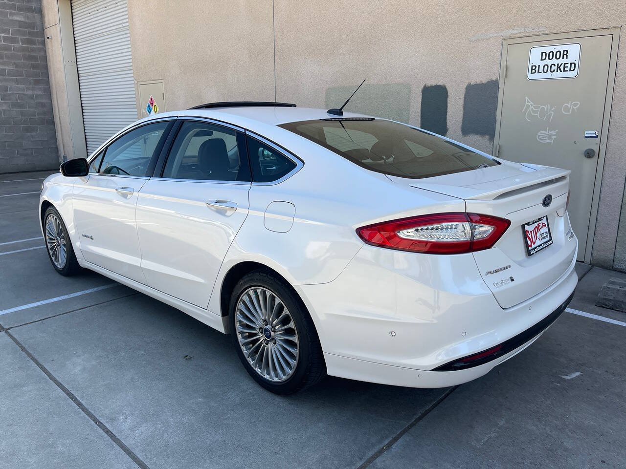 2014 Ford Fusion Hybrid for sale at Super Auto Sales Modesto in Modesto, CA