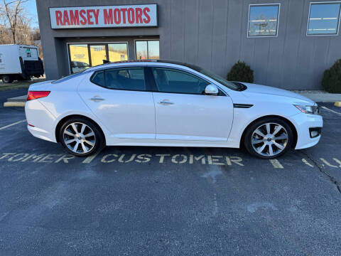 2011 Kia Optima for sale at Ramsey Motors in Riverside MO