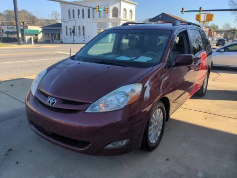 2010 Toyota Sienna for sale at ROBINSON AUTO BROKERS in Dallas NC