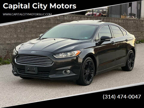 2014 Ford Fusion for sale at Capital City Motors in Saint Ann MO