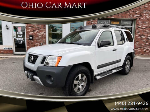 2012 Nissan Xterra for sale at Ohio Car Mart in Elyria OH