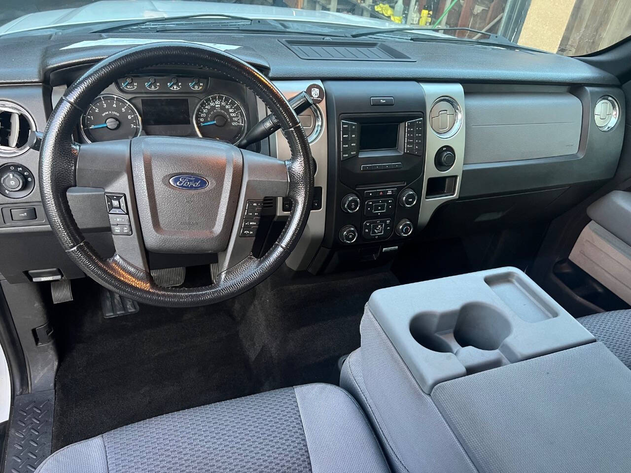 2013 Ford F-150 for sale at AUTO 4 LESS in Fresno, CA